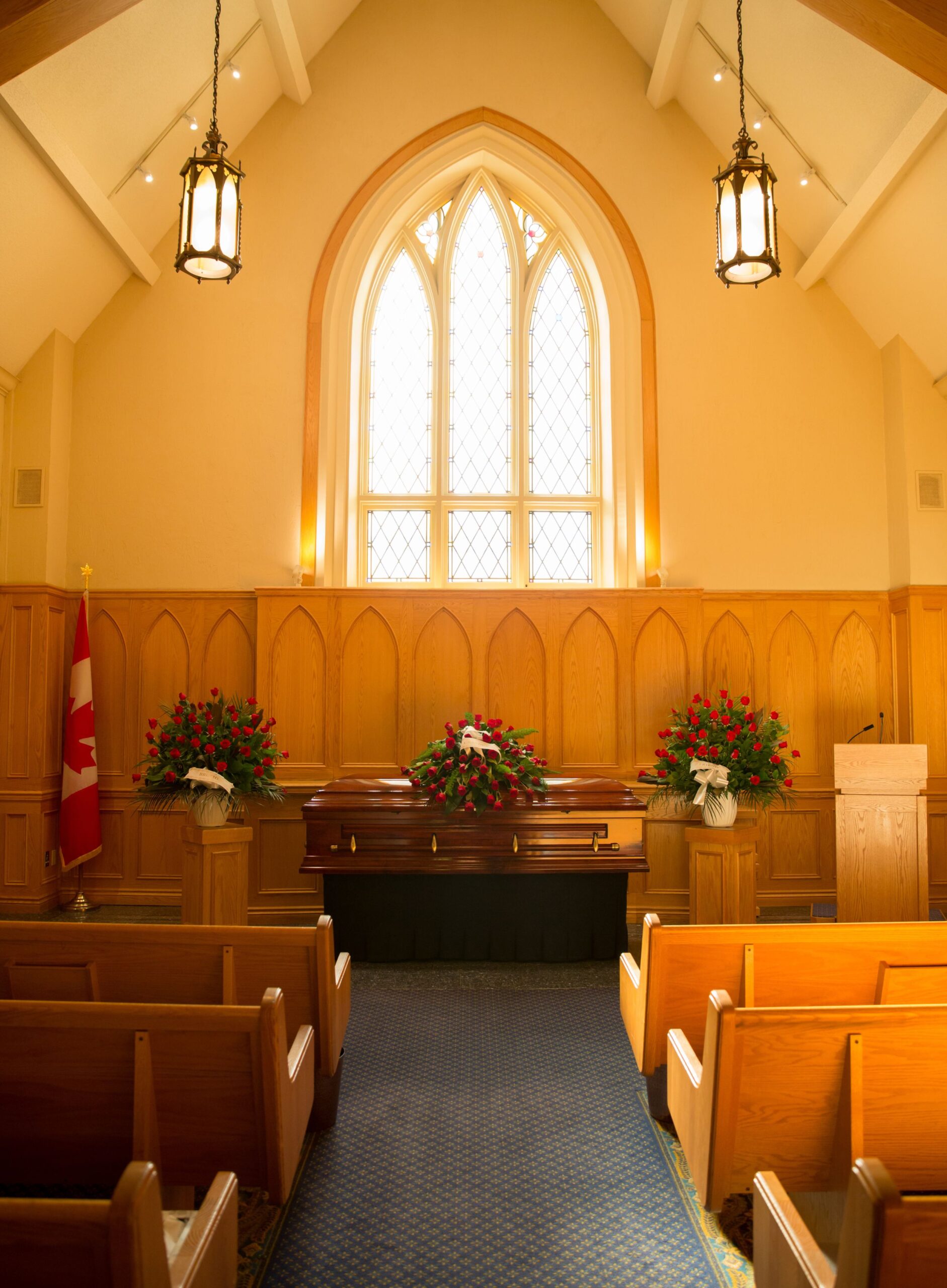 Church scene with a casket in front, representing the need for dedicated funeral answering services.
